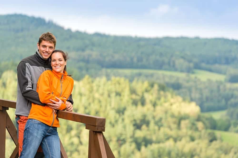 Happy couple posing in the mountains in Pigeon Forge