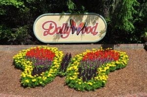 The Dollywood sign and flowers arranged as a butterfly.