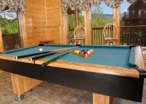 A pool table in a Smoky Mountain cabin rental.