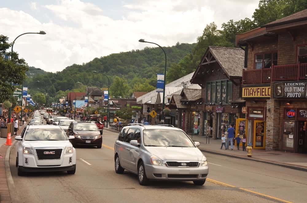 Cars driving down the Parkway in downtown Gatlinburg.
