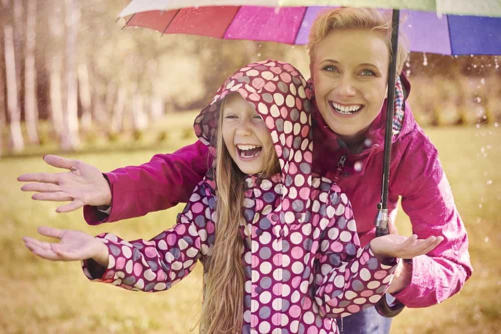 Mother and daughter in the rain.