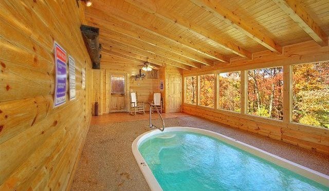 The indoor pool at a Smoky Mountain cabin.