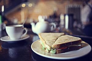 tea put and mug with sandwich